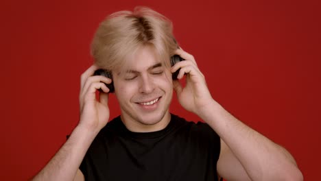 man enjoying music with headphones