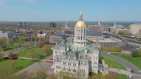 aerial drone shot of the capitol in hartford connecticut with a whip pan at the end for transitions