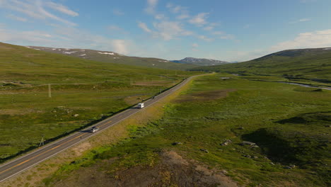 Motorhome-and-cars-driving-along-the-picturesque-Saltfjellet-mountain-pass