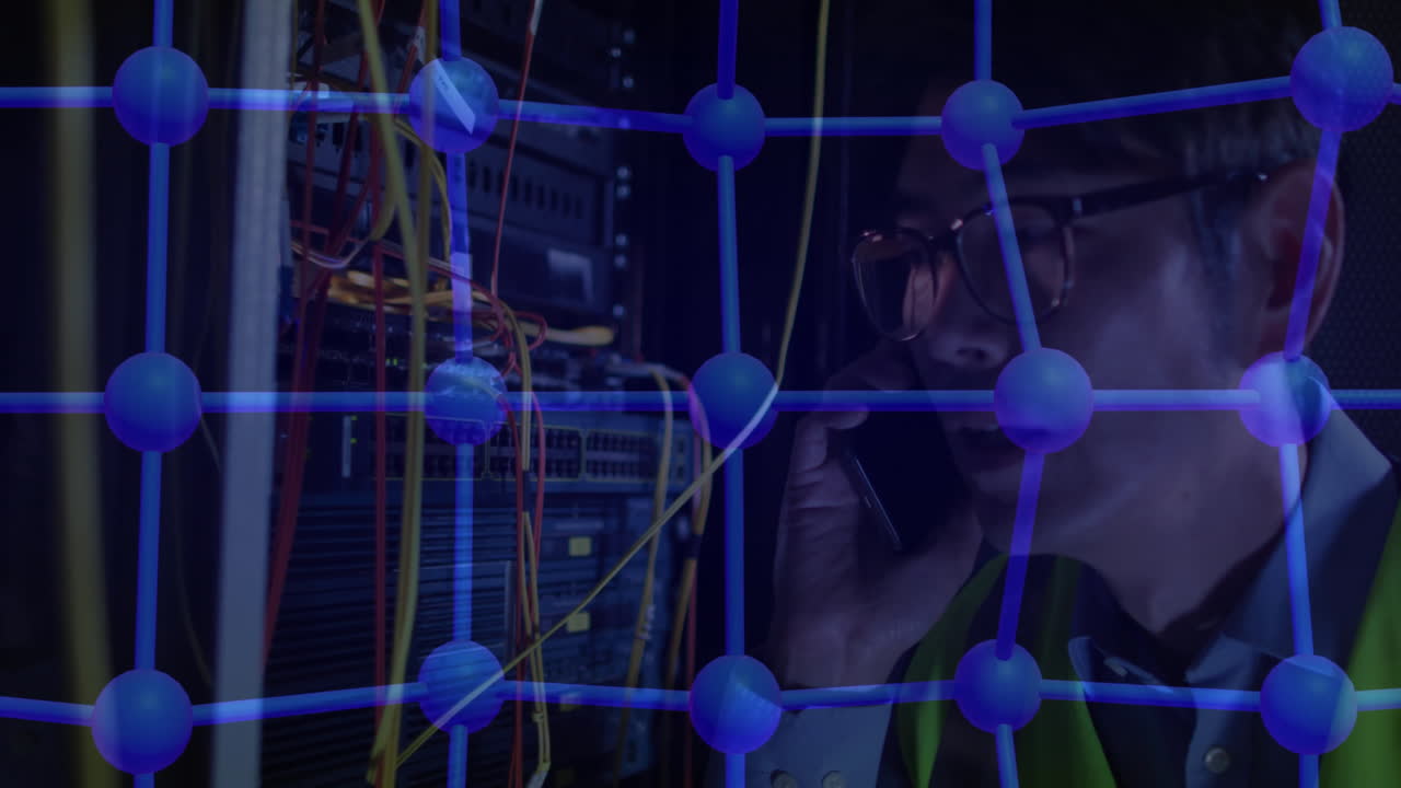 In server room, person using phone while network connections animation processing data