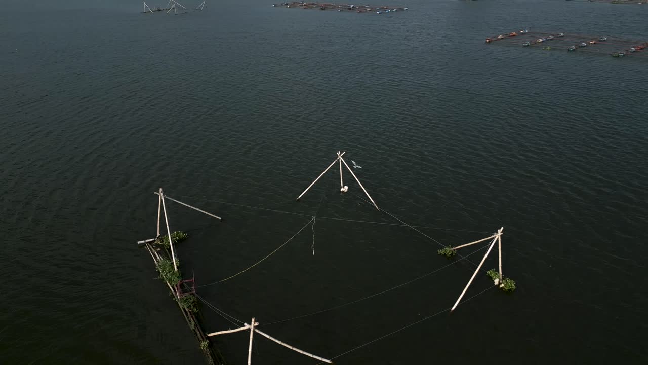Aerial View of Fishing Nets and Fish Farms on a Lake