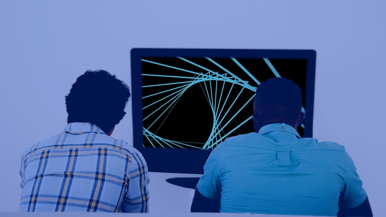 Composition of back of two diverse men watching tv