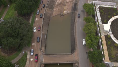 Reveal-drone-shot-of-flooding-on-Allen-Parkway-in-Houston,-Texas