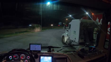 pov through an rv windshield while stopped at a rest area