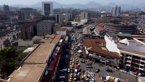 busy streets in capital city of yaounde, cameroon - aerial drone view