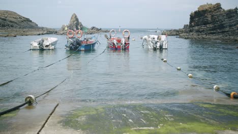 Fishing-Boats-float-at-a-Fishing-Dock-in-Alentejo,-Portugal