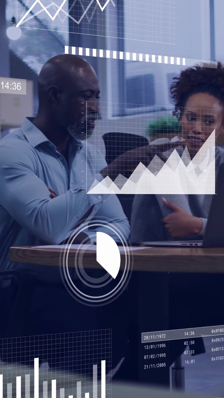 Vertical video: Coworkers gesturing as business charts appearing over laptop reviewing metrics