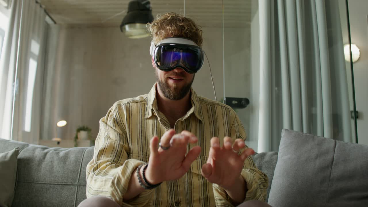 Man using VR headset at home