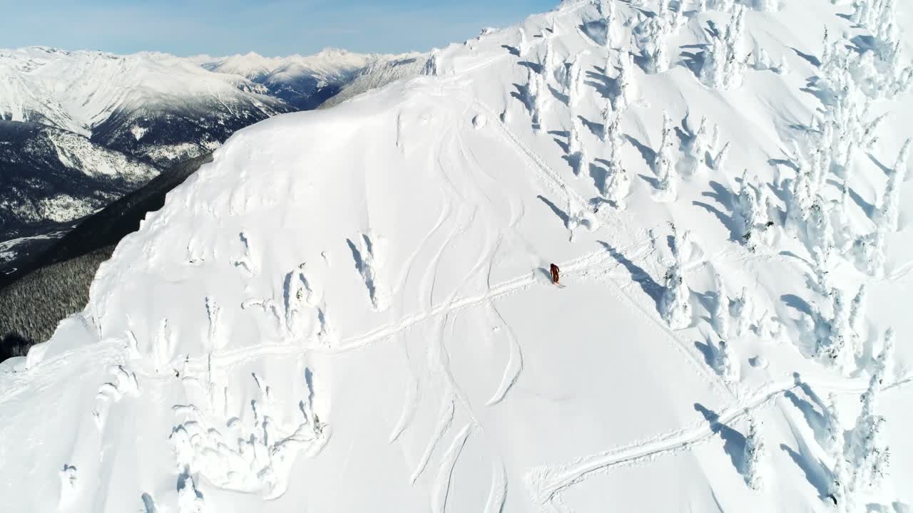 Skier skiing on a snow capped mountain 4k
