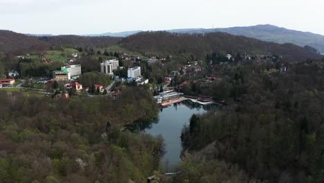 aerial forward over ursu lake and surrounding landscape, sovata. romania