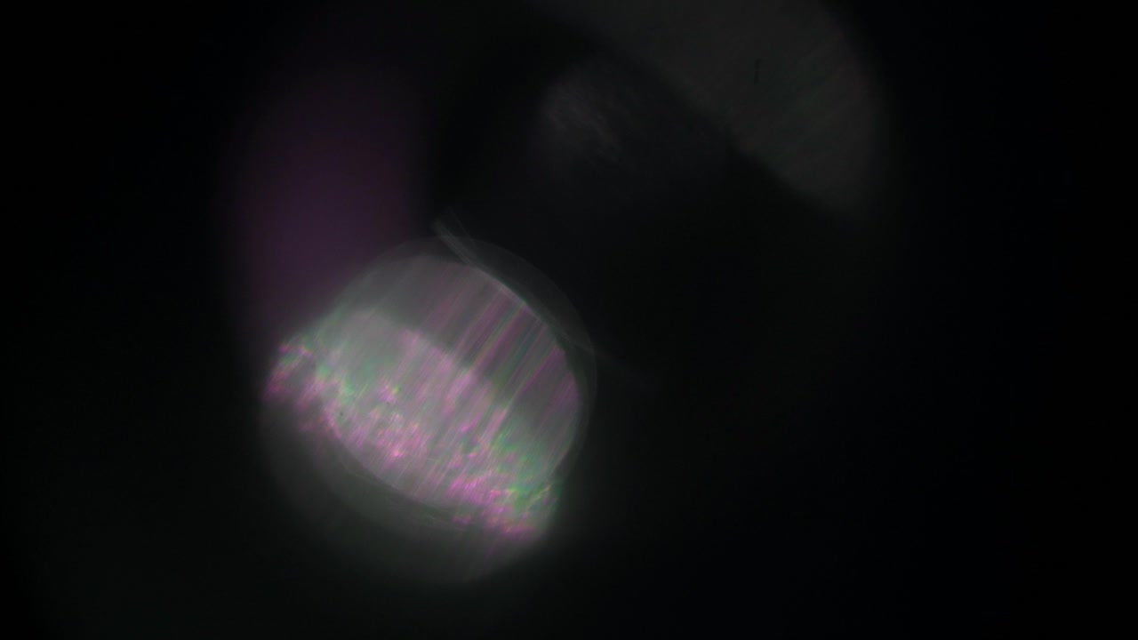 Abstract Optical Lens Flare Light Leaks on Black Background
