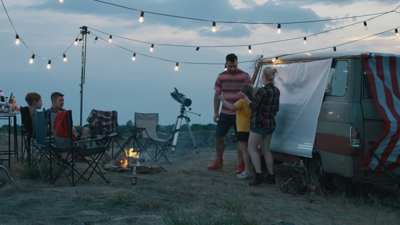 Family Camping Trip at Dusk