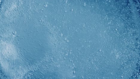 oxygen bubbles in water on a blue abstract background