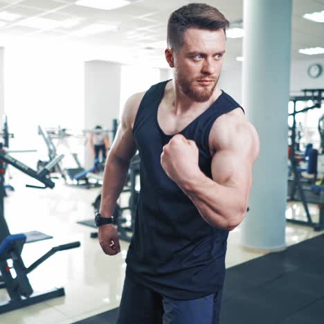 athletic man model posing at gym