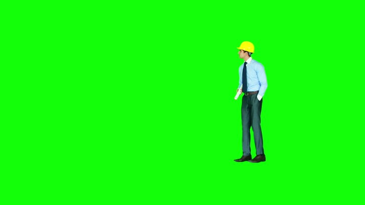 Businessman looking at business wall