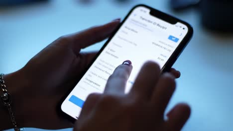 user interacts with a mobile app, navigating through options to share personal information at a social gathering. the setting is dimly lit, creating a casual atmosphere.