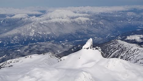 Snowy-Mountain-Landscape-on-a-Beautiful-Sunny-Winter-Day-AERIAL