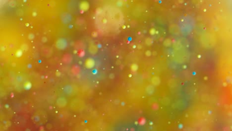 abstract chaotic motion of particles in space. slow motion bright colors bubbles oil paint universe moving multicolored close up. acrylic paint. fantastic hypnotic surface. big bang. nanotechnology.