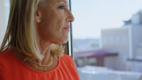 Disabled-woman-having-coffee-in-the-balcony-4k