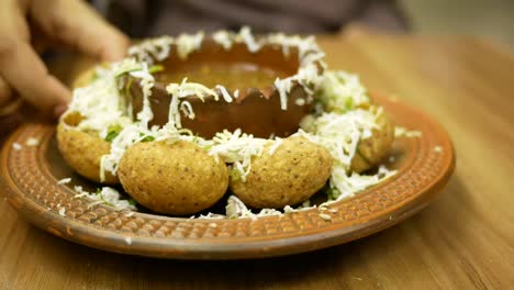 a delicious plate of pani puri