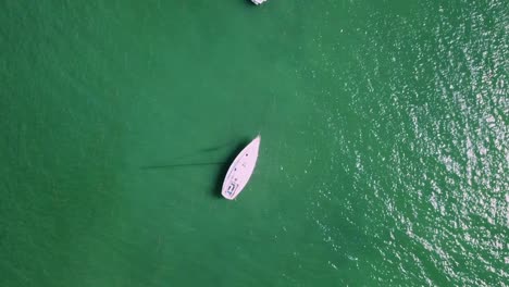 droning in fajardo puerto rico along the coast over a sailboat anchored