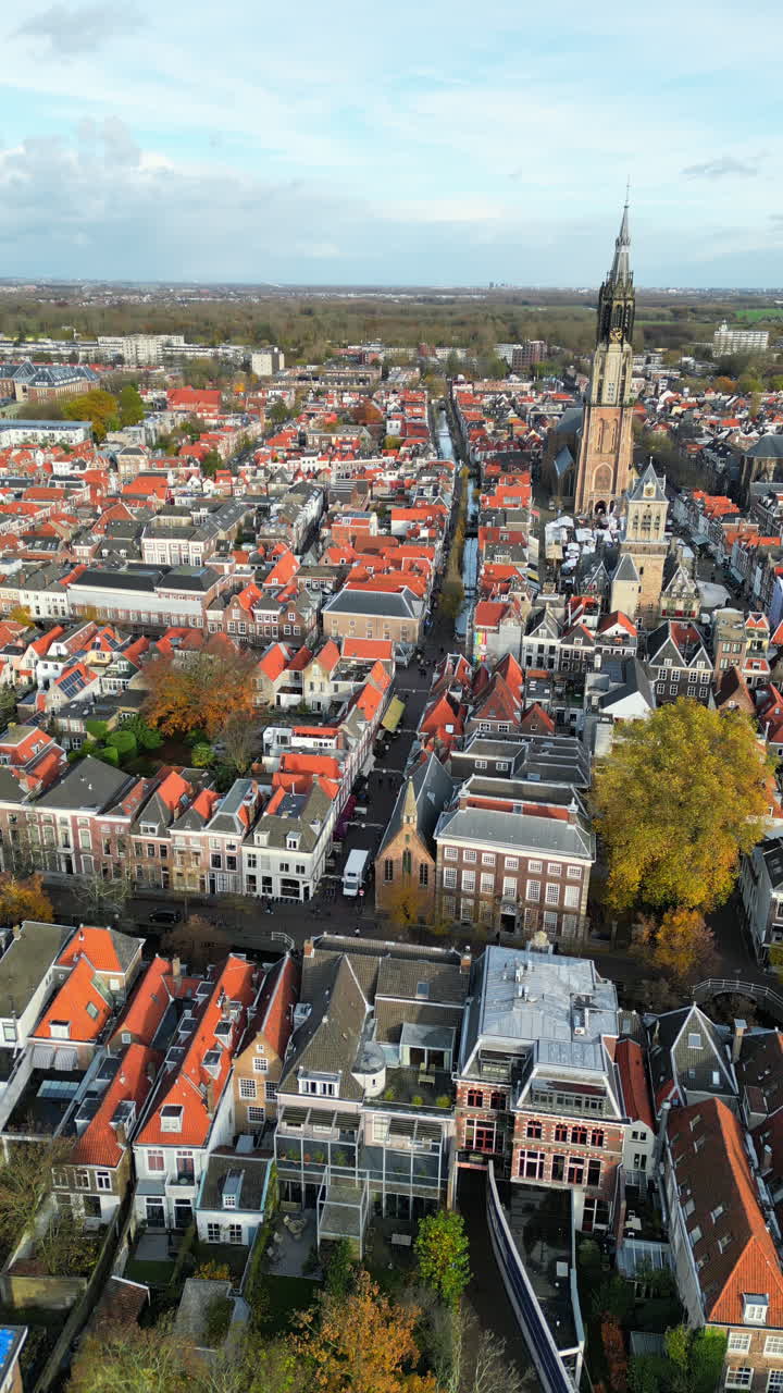 Aerial drone view of the Nieuwe Kerk Protestant church in the city of Delft in the Netherlands. Vertical