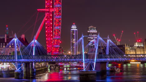 london eye and houses of parliament at night