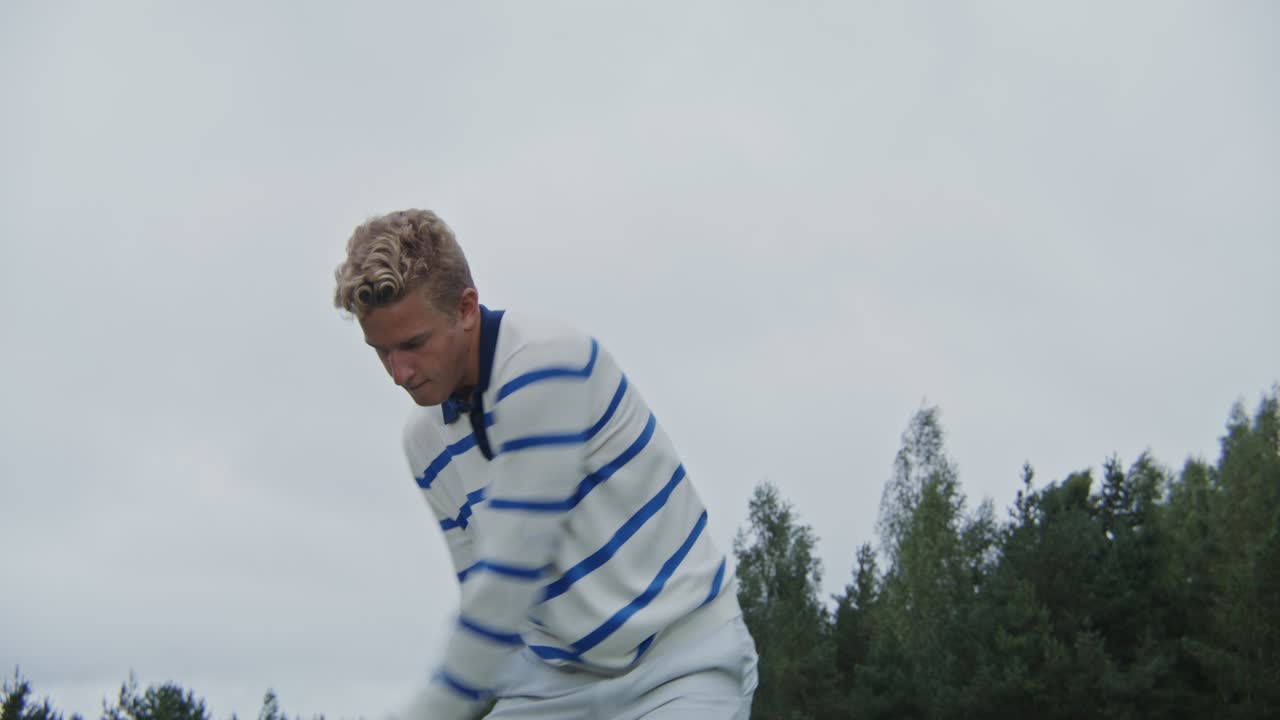 Man Playing Golf