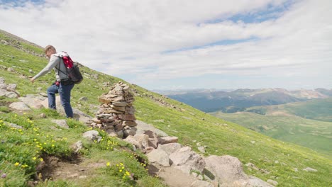 Hiker-Walking-Among-Grassy-Tundra-|-Mount-Bierstadt,-Colorado