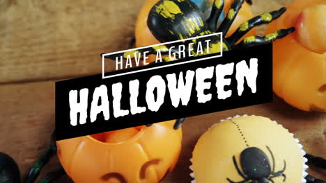 have great halloween text over halloween decorations with spiders and pumpkins