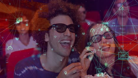 animación del procesamiento de datos sobre una pareja caucásica sonriente comiendo palomitas de maíz en el cine