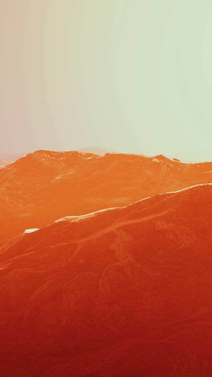 Stunning Orange Sunset Over Majestic Mountains