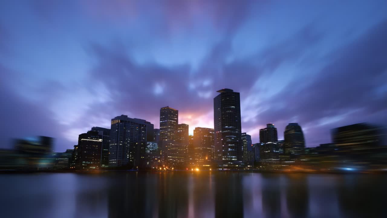 Dramatic Night Skyline: A Stunning Glow Illuminates the Modern Urban Landscape with Reflective Waters, Showcasing the Vibrant Life in a City After Sunset