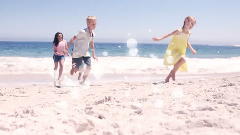 Puntos-De-Luz-Blanca-En-Movimiento-Con-La-Familia-En-La-Playa