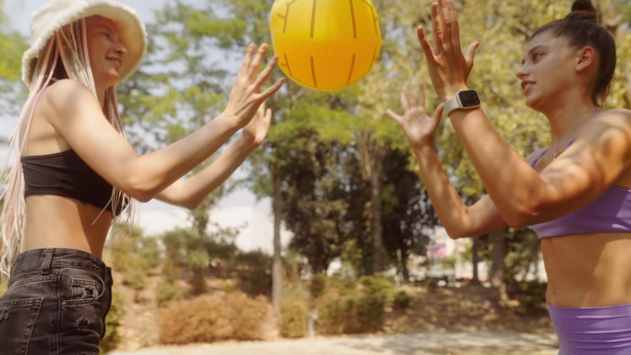 Two women exercising in a park