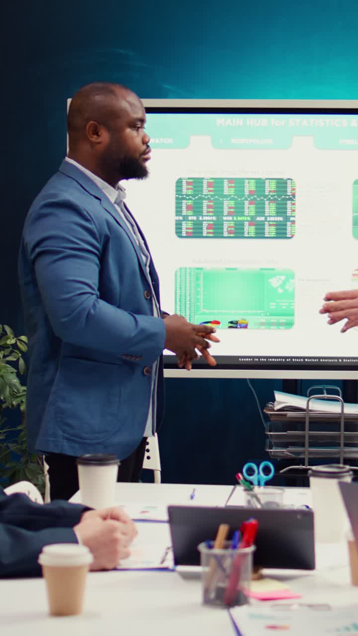 Diverse Businessmen Shaking Hands in Modern Office Meeting