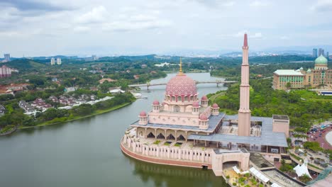 aerial view hyperlapse 4k video of putra square with putra mosque and perdana putra putrajaya malaysia.