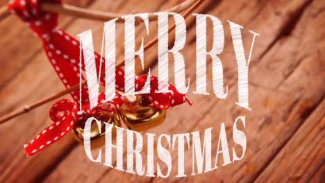 Animation-of-merry-christmas-text-in-white-falling-over-christmas-bell-decorations-and-wooden-boards