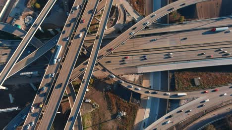 Aerial-of-cars-on-59-South-and-610-South-loop-freeway-in-Houston,-Texas