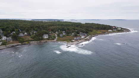 aerial view of coastal houses and ocean