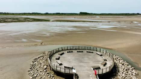 boardwalk and jetty at het zwin nature reserve, popular park and tourist destination near netherlands and belgium border