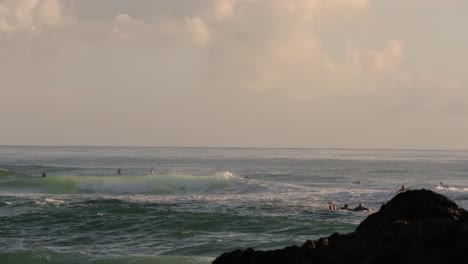 26 feb 2023 - gold coast, queensland, australia: view from currumbin beach vikings surf life saving club along currumbin beach at sunrise