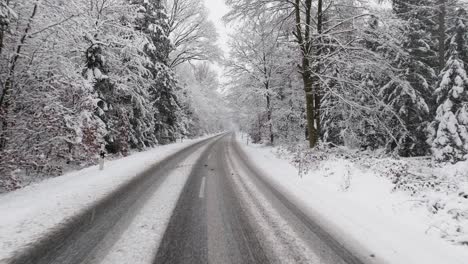 Aerial-view-of-a-snowy-road-in-northern-germany