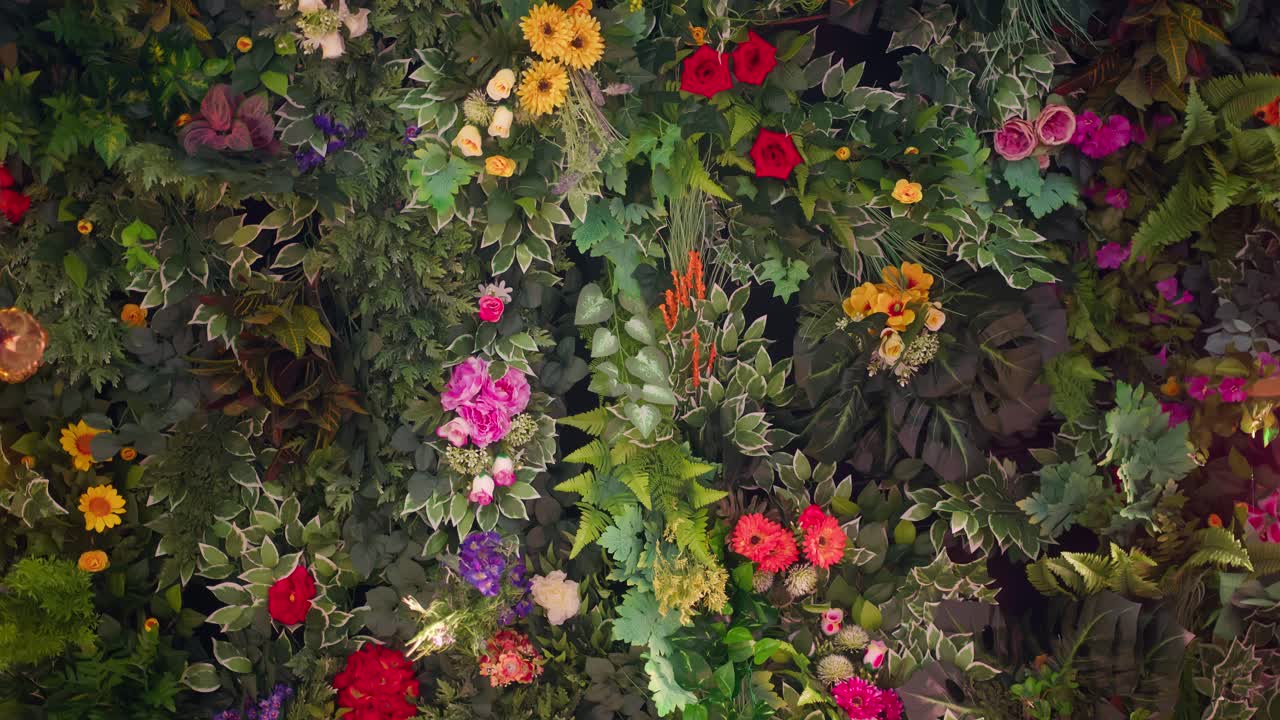 Static shot of floral ceiling with colorful flowers and green plants in Taormina, Sicily, Italy (Sicilia, Italia)