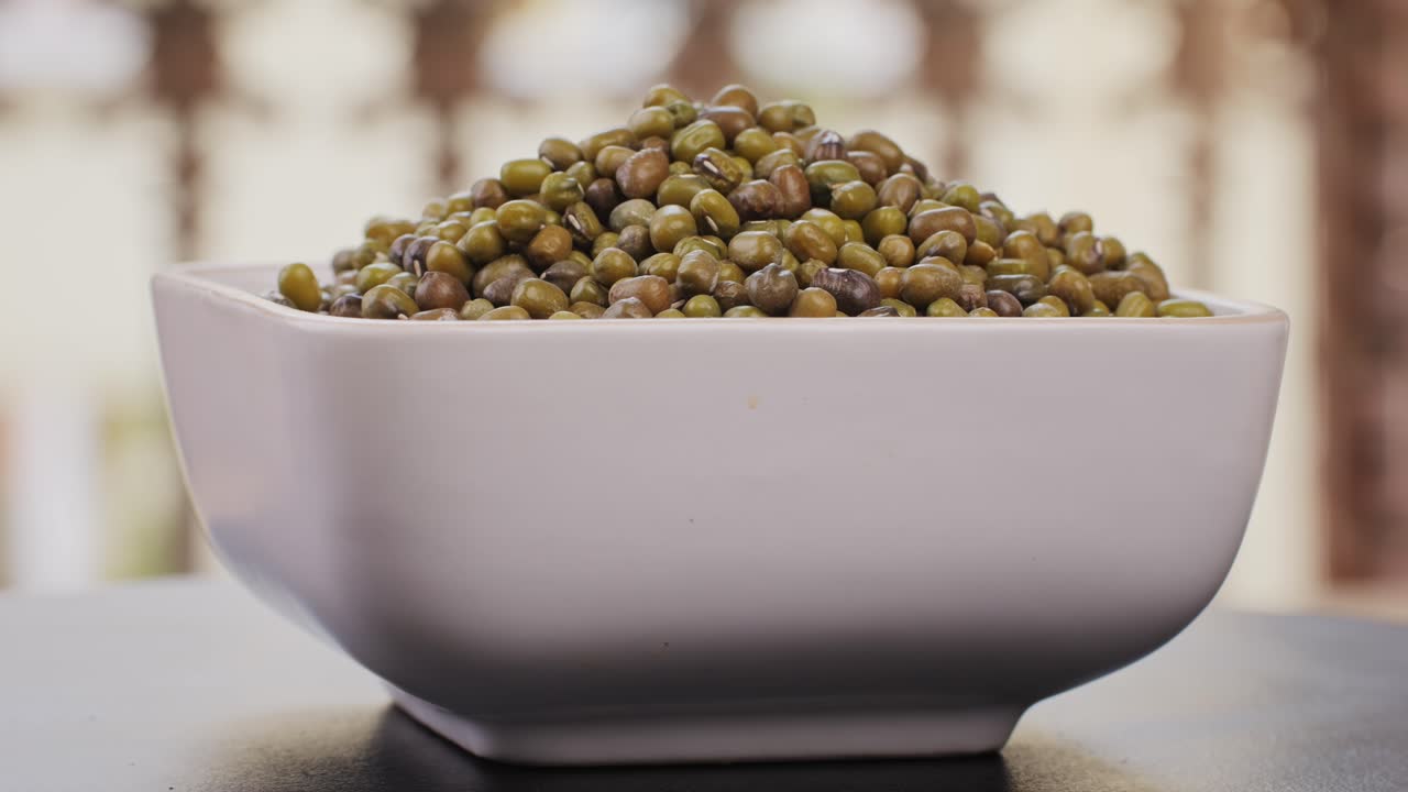 Pile of Mung Beans in a White Bowl