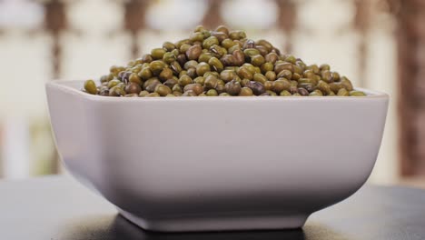 pile of mung beans in a white bowl