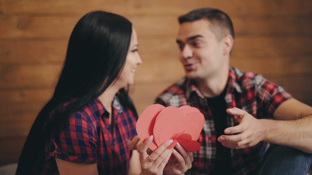 Portrait of couple in love. Studio shot of couple in love having fun