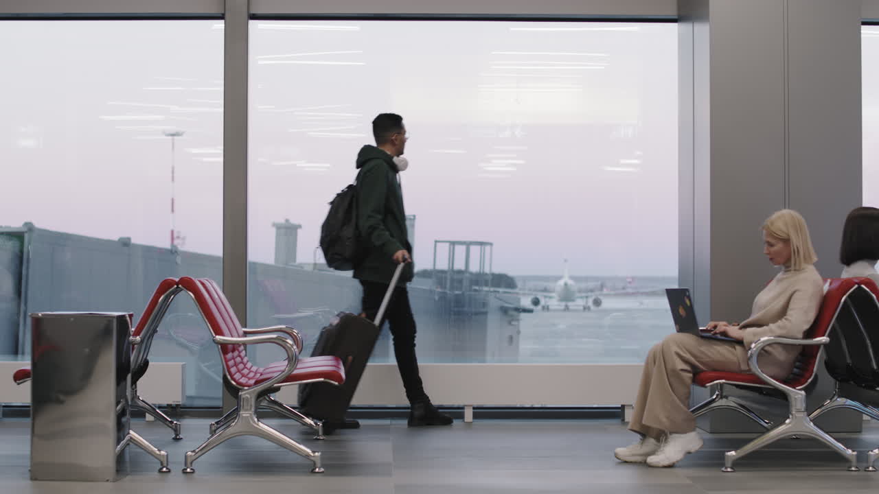 Man Looking At Runway