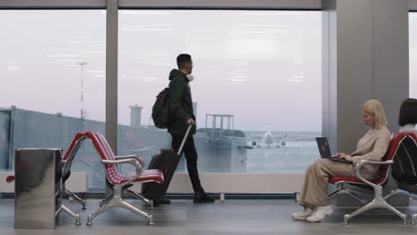 man looking at runway