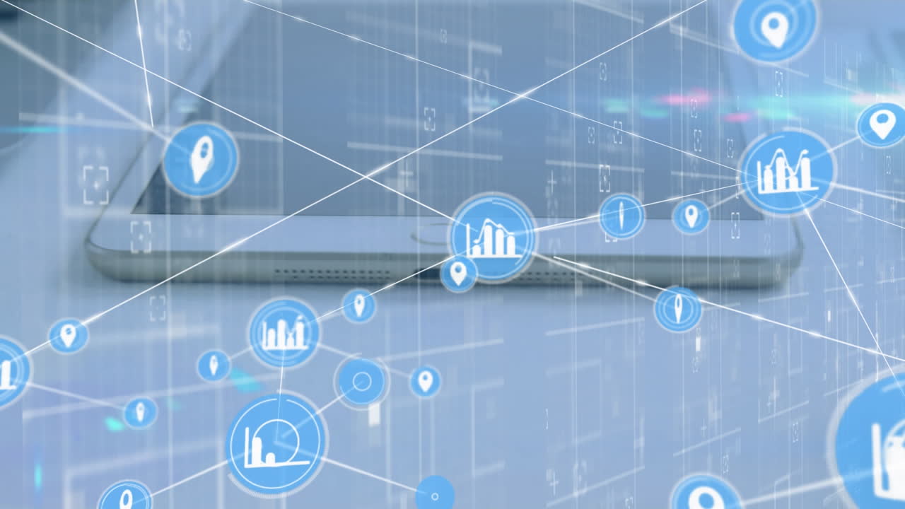 디지털 아이콘의 네트워크와 사무실 테이블에 있는 전자 장치에 대한 빛의 점